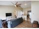 Spacious living room opens to kitchen; ceiling fan, sliding glass doors, and comfortable seating area at 13157 Sw 35Th Cir, Ocala, FL 34473
