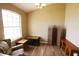 Cozy living room with natural light, stylish furniture, and modern flooring at 13157 Sw 35Th Cir, Ocala, FL 34473