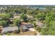 Aerial view of the home showcases its location amidst lush greenery and nearby lake at 1326 W Concord St, Orlando, FL 32805