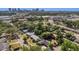 An aerial view of a neighborhood with lush greenery, and the downtown skyline in the background at 1326 W Concord St, Orlando, FL 32805