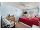 Comfortable bedroom with a large bed, dresser, and natural light at 134 Foggy Creek Ct, Davenport, FL 33837
