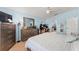 Comfortable main bedroom with ensuite bathroom, desk, and ample storage at 134 Foggy Creek Ct, Davenport, FL 33837