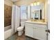Cozy bathroom with tile accents, shower, and vanity at 13890 Sato Ave, Orlando, FL 32827