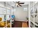 View of a home office featuring french doors, creating an ideal work-from-home environment at 13890 Sato Ave, Orlando, FL 32827