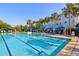 Relaxing swimming pool with lap lanes and cozy cabanas, perfect for unwinding in style and comfort at 13890 Sato Ave, Orlando, FL 32827