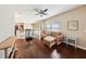 Inviting upstairs living space with hardwood flooring, comfortable seating, and bright, airy atmosphere at 13890 Sato Ave, Orlando, FL 32827
