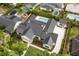 Stunning aerial view of a modern home, lush greenery, and inviting pool area at 1400 Nottingham St, Orlando, FL 32803