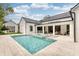 Impressive backyard with a pool, spa, and outdoor kitchen, ideal for relaxation and entertaining at 1400 Nottingham St, Orlando, FL 32803