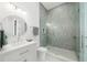 Bathroom featuring a glass enclosed shower with subway tile surround, and modern fixtures at 1400 Nottingham St, Orlando, FL 32803