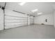 Spacious garage with modern doors and ample room for parking and storage at 1400 Nottingham St, Orlando, FL 32803