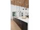 Spacious island kitchen with a long breakfast bar, wood ceiling beams, and modern appliances at 1400 Nottingham St, Orlando, FL 32803