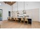 Bright kitchen featuring a large island, pendant lights, and wood floors at 1400 Nottingham St, Orlando, FL 32803