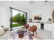 Inviting living room with a tiled floor and sliding glass door for seamless indoor-outdoor living at 1400 Nottingham St, Orlando, FL 32803