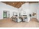 Bright living room with a vaulted ceiling, fireplace, and hardwood floors with decorative decor at 1400 Nottingham St, Orlando, FL 32803