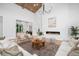 Inviting living room with a fireplace, wood ceiling beams, and open layout at 1400 Nottingham St, Orlando, FL 32803