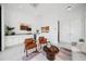 Bright living room featuring sleek modern furniture, white walls and a tiled floor at 1400 Nottingham St, Orlando, FL 32803
