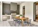 Outdoor kitchen complete with modern stainless steel appliances and a dining area for alfresco meals at 1400 Nottingham St, Orlando, FL 32803
