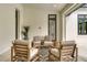 Covered patio featuring comfortable seating and a stylish rug, perfect for relaxing outdoors at 1400 Nottingham St, Orlando, FL 32803