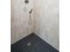 Modern shower with gray tile and two shower heads, perfect for a relaxing experience at 1400 Nottingham St, Orlando, FL 32803