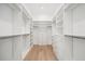 Walk-in closet with an abundance of shelves and drawers, maximizing storage and organization at 1400 Nottingham St, Orlando, FL 32803