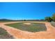 Community baseball field with a clay infield and well-maintained grass, perfect for sports and recreational activities at 1415 Sherbourne St, Winter Garden, FL 34787