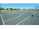 Outdoor basketball court with multiple hoops and clear markings, perfect for sports and recreational activities at 1415 Sherbourne St, Winter Garden, FL 34787