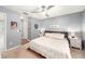 Cozy bedroom with soft carpet, a ceiling fan, and calming blue-grey wall paint at 1415 Sherbourne St, Winter Garden, FL 34787