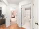 Hallway view leading to the pink Bedroom and primary bathroom at 1415 Sherbourne St, Winter Garden, FL 34787