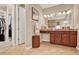 Bathroom features tile floors, granite counters, large mirror and walk in closet at 1424 Palisades Lane, Deland, FL 32724