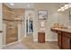 Bathroom features tile floors, granite counters, large shower with glass doors and walk in closet at 1424 Palisades Lane, Deland, FL 32724
