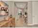 Hallway featuring neutral paint, tile floors, and decorative furnishings at 1424 Palisades Lane, Deland, FL 32724