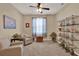 Cozy living room with large windows, neutral colors, and comfortable seating at 1424 Palisades Lane, Deland, FL 32724