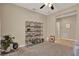 Spacious living room with neutral paint, ceiling fan, and carpet floor at 1424 Palisades Lane, Deland, FL 32724