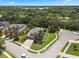 Tranquil aerial vista captures homes among lush greenery, featuring well-kept lawns at 14315 Hampshire Bay Cir, Winter Garden, FL 34787