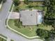Bird's-eye view of a home boasting a screened-in pool and a well-manicured lawn at 14315 Hampshire Bay Cir, Winter Garden, FL 34787