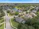 Picturesque neighborhood with a pond and fountain, well-manicured lawns, and beautiful single Gathering homes at 14315 Hampshire Bay Cir, Winter Garden, FL 34787