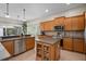 Well-lit kitchen featuring stainless steel appliances and ample counter space at 14315 Hampshire Bay Cir, Winter Garden, FL 34787