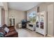 A comfortable office space with natural lighting and stylish furniture at 14315 Hampshire Bay Cir, Winter Garden, FL 34787
