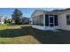 An enclosed sunroom offering an extension of living space at 1705 Betrillo Ct, The Villages, FL 32162