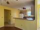 Practical kitchen with standard appliances, breakfast bar, and plenty of countertop space at 1705 Betrillo Ct, The Villages, FL 32162