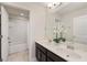 Bathroom featuring double sinks, modern cabinets, tile floors, and a shower and tub combo at 1710 Alejo Dr, Apopka, FL 32712