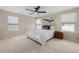 Bedroom with neutral walls, carpet, and large ceiling fan at 1710 Alejo Dr, Apopka, FL 32712