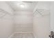 A walk-in closet with carpet and adjustable wire shelving offering ample storage solutions at 1710 Alejo Dr, Apopka, FL 32712