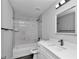 Bathroom with marble tile features a shower and a new vanity sink at 17468 Sw 36Th Ter, Ocala, FL 34473