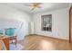 Simple bedroom with laminate flooring, a window, and room for a bed and desk at 2102 E Atmore Cir, Deltona, FL 32725