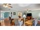 Open concept living room with hardwood floors and plenty of natural light at 222 Paul Mcclure Ct, Casselberry, FL 32707