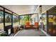 Enjoy the spacious screened porch with an outdoor view, perfect for relaxing and entertaining at 222 Paul Mcclure Ct, Casselberry, FL 32707