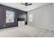 Bright bedroom featuring carpet, a large aquarium, and a ceiling fan at 2412 Gold Dust Dr, Clermont, FL 34715