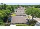 Neighborhood backyard aerial view, showcasing pools, mature trees and well maintained yards at 2515 Wekiva Walk Way, Apopka, FL 32703
