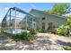 Exterior view of the home highlighting the backyard, pool and screened in lanai at 2515 Wekiva Walk Way, Apopka, FL 32703